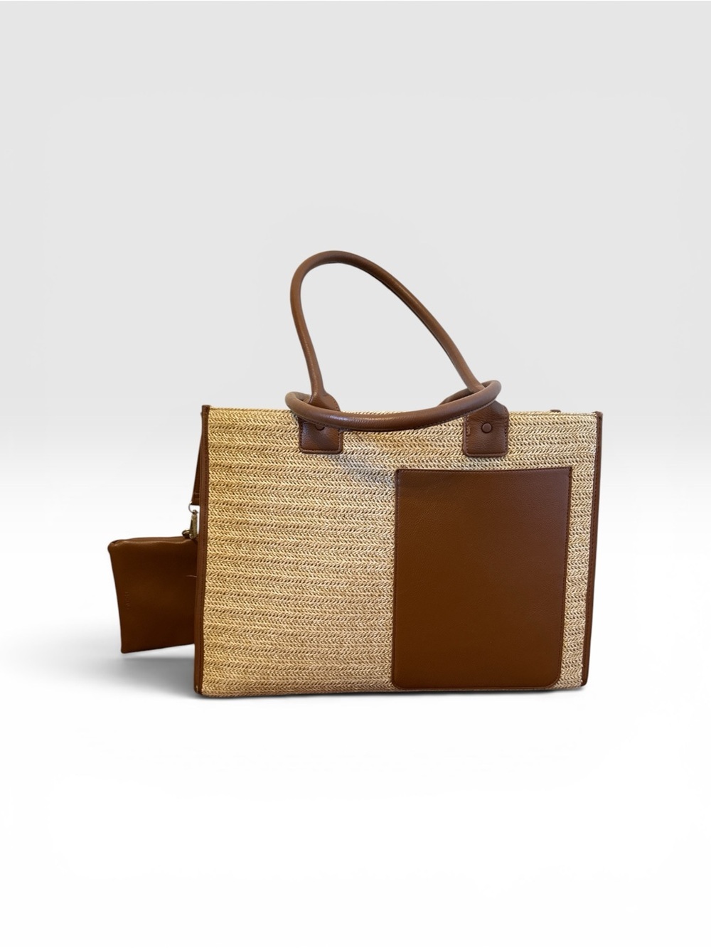 BCBG Two-Tone Straw Tote with Brown Leather Accents and room for laptop